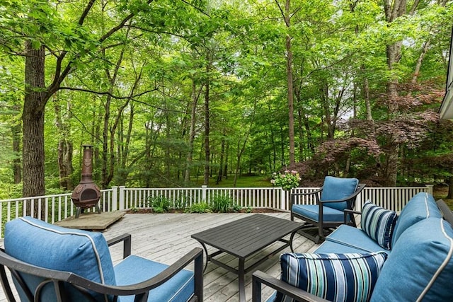 213 N Worcester St, Norton, MA 02766 - wooden terrace with an outdoor living space and a wooded view