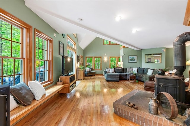 213 N Worcester St, Norton, MA 02766 - living room with plenty of natural light, lofted ceiling, and wood finished floors