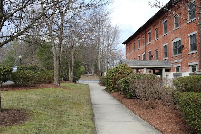 view of home's community featuring a yard