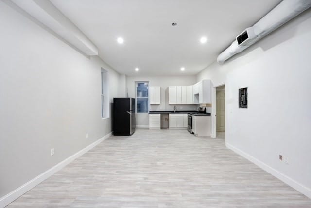 interior space with light hardwood / wood-style flooring