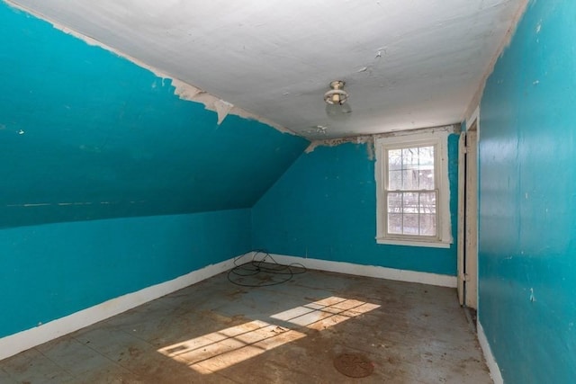 bonus room featuring lofted ceiling