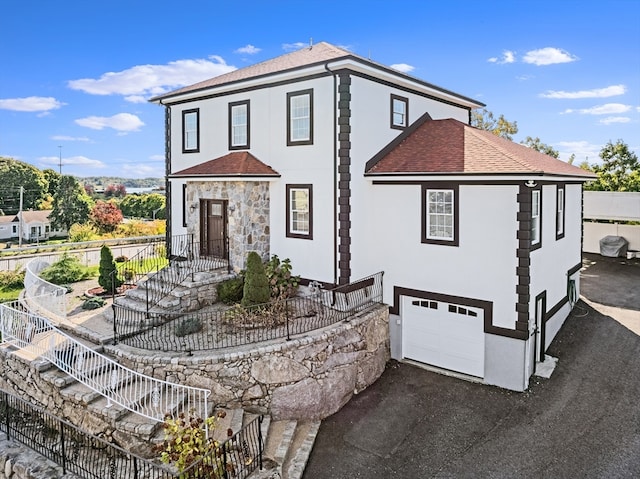 view of front of house with a garage