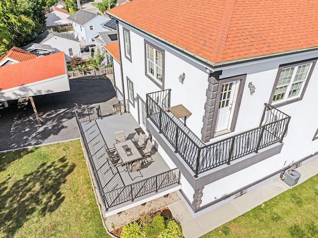 exterior space with a patio and a yard