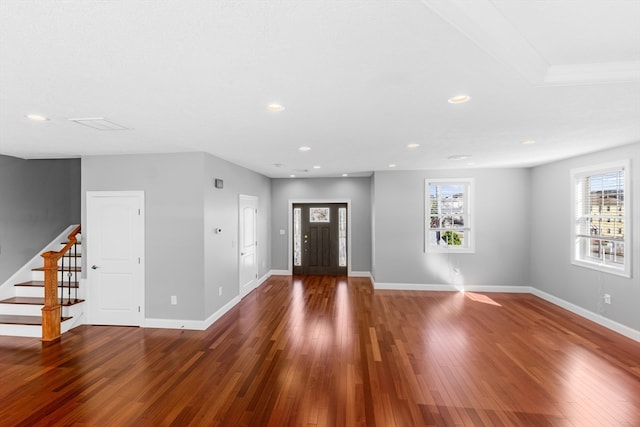 foyer entrance with dark wood-type flooring