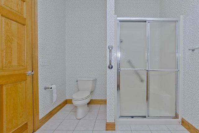 24 High Pines Cir Unit 24, Wilbraham, MA 01095 - bathroom with wallpapered walls, a shower stall, toilet, and tile patterned floors