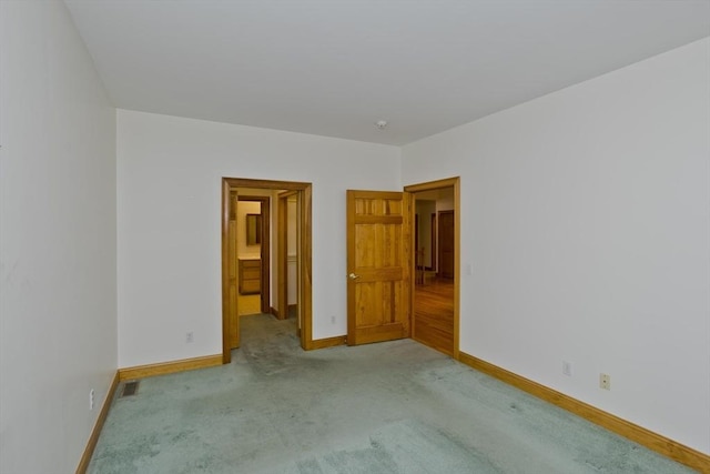 24 High Pines Cir Unit 24, Wilbraham, MA 01095 - unfurnished bedroom with baseboards and carpet flooring
