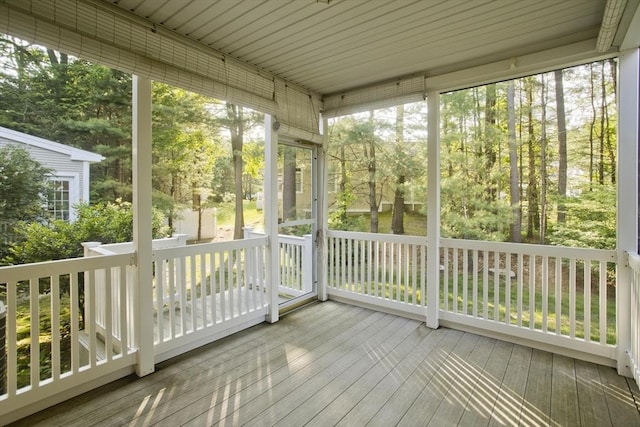 24 High Pines Cir Unit 24, Wilbraham, MA 01095 - unfurnished sunroom featuring view of wooded area