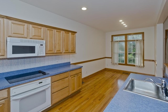 24 High Pines Cir Unit 24, Wilbraham, MA 01095 - kitchen featuring white appliances, a sink, light wood finished floors, decorative backsplash, and recessed lighting