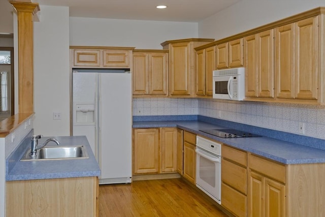 24 High Pines Cir Unit 24, Wilbraham, MA 01095 - kitchen with white appliances, a sink, tasteful backsplash, light wood-style flooring, and recessed lighting