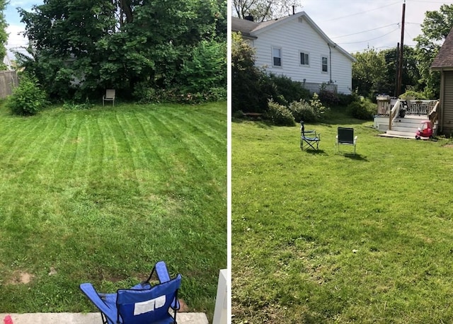 view of yard with a wooden deck