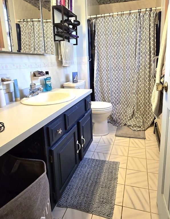 14 Many Oaks Cir, Yarmouth, MA 02675 - bathroom featuring vanity, a shower with curtain, and tile patterned floors