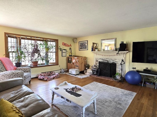 14 Many Oaks Cir, Yarmouth, MA 02675 - living room with wood finished floors and a tile fireplace