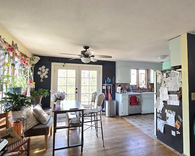 14 Many Oaks Cir, Yarmouth, MA 02675 - dining room with french doors, a ceiling fan, and light wood-type flooring