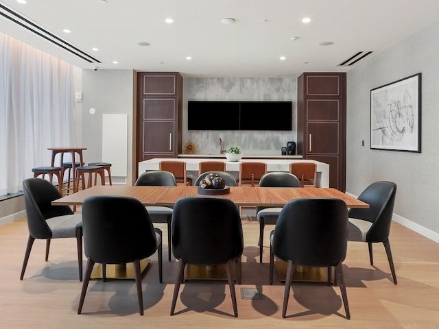 dining room featuring light hardwood / wood-style floors