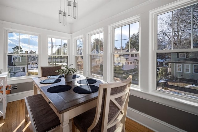 sunroom / solarium with plenty of natural light