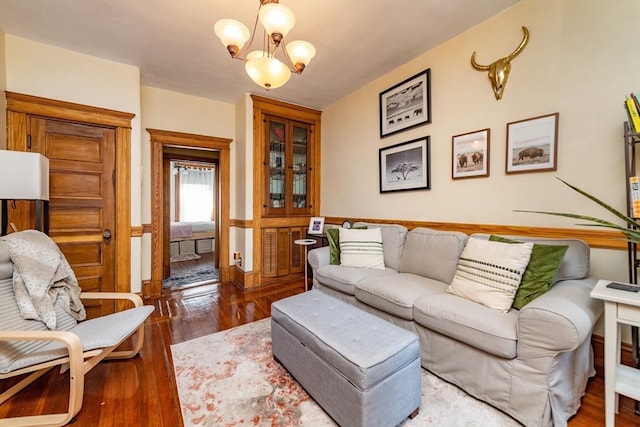 49 Revere St Unit 4, Boston, MA 02114 - living room featuring wood finished floors and a chandelier