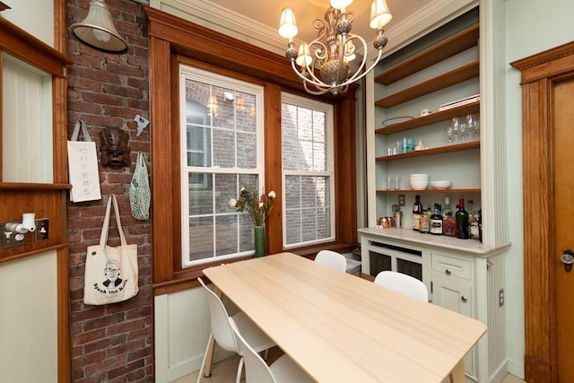 49 Revere St Unit 4, Boston, MA 02114 - dining space featuring a chandelier, a dry bar, and baseboards