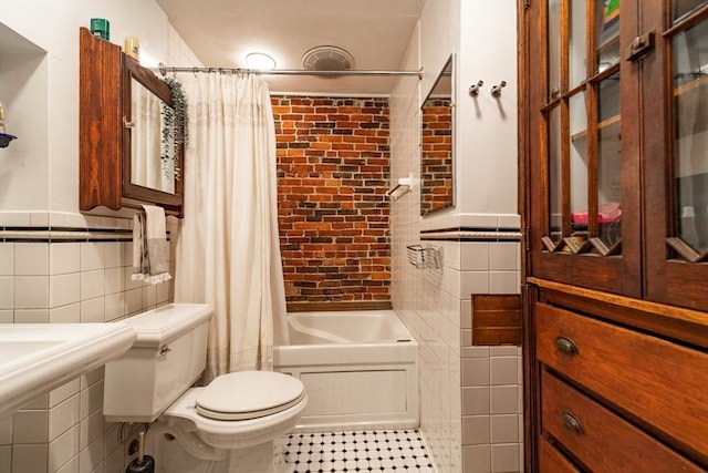 49 Revere St Unit 4, Boston, MA 02114 - bathroom featuring tile walls, toilet, shower / bath combination with curtain, and tile patterned flooring
