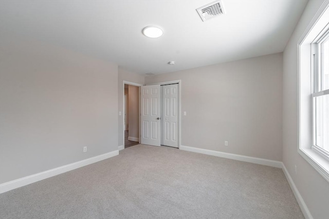 view of carpeted spare room