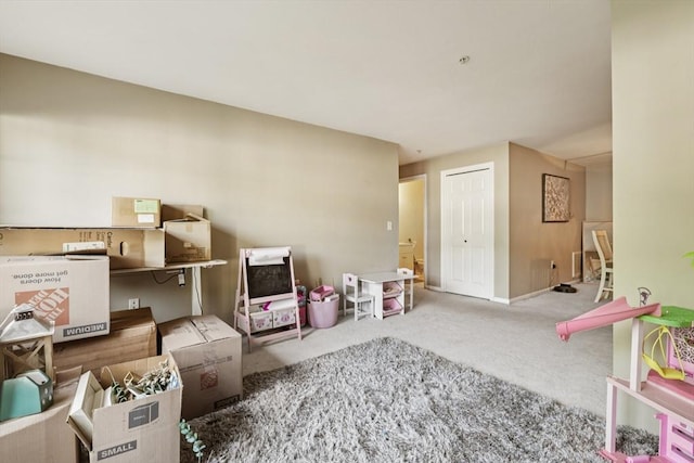1 Riverview Blvd Unit 2-106, Methuen, MA 01844 - recreation room with carpet floors and baseboards