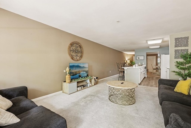 1 Riverview Blvd Unit 2-106, Methuen, MA 01844 - living room with baseboards and light carpet