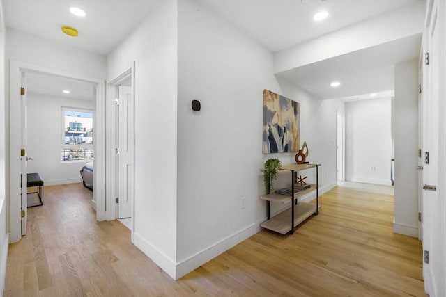 hall with light wood-type flooring