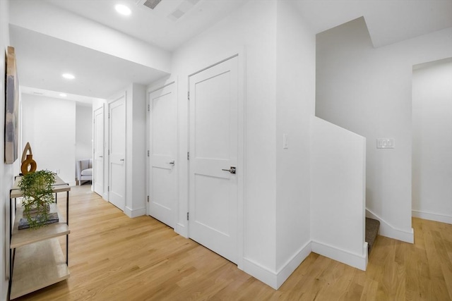 hallway featuring wood-type flooring