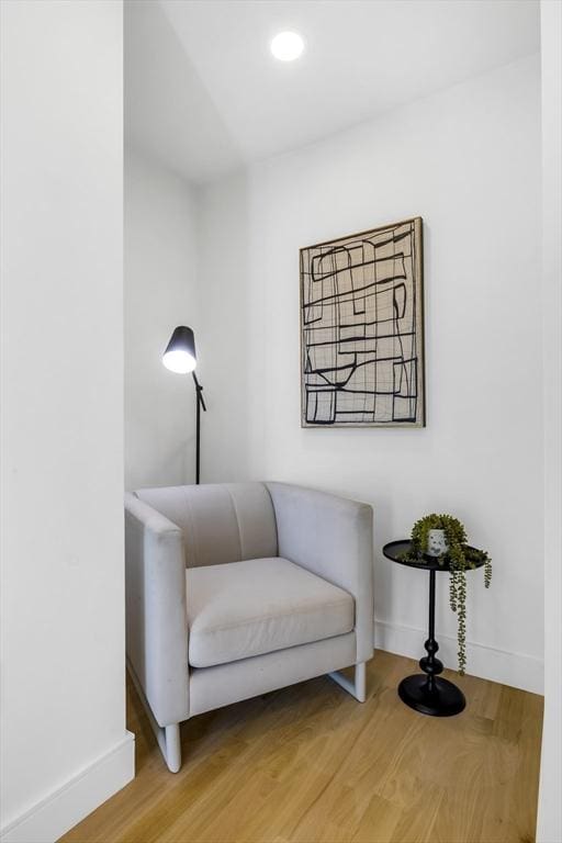 living area featuring hardwood / wood-style flooring