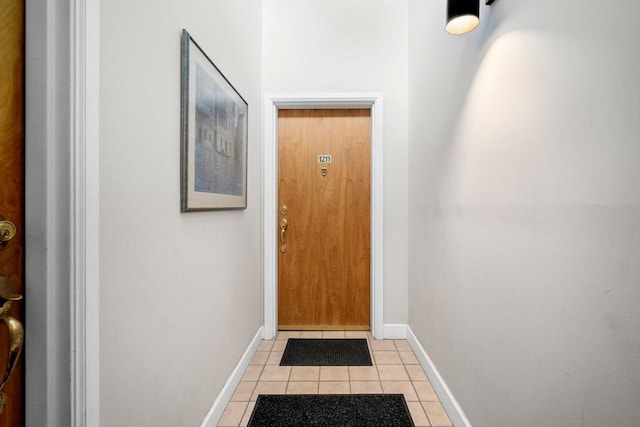 30 N Stone Ml Unit 1211, Dedham, MA 02026 - doorway to outside with light tile patterned floors and baseboards