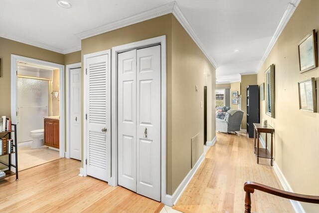 30 N Stone Ml Unit 1211, Dedham, MA 02026 - hall featuring crown molding, recessed lighting, and light wood-style flooring