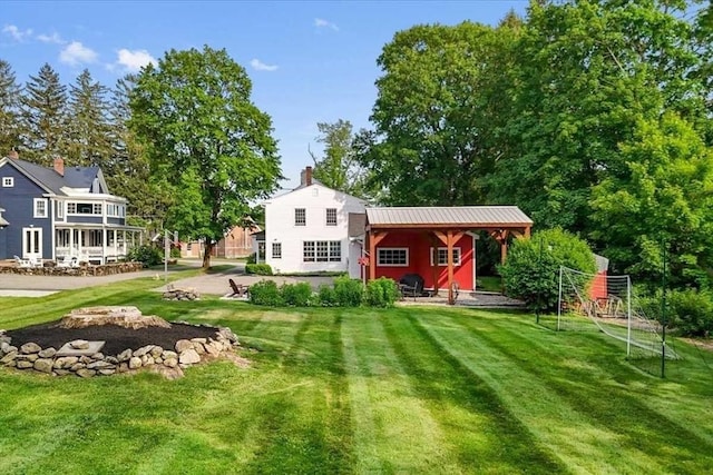 57 Highland St, Holden, MA 01520 - rear view of house with a lawn