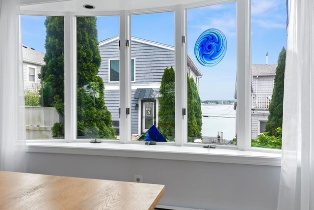 80 Lennox Rd Unit 1, Nahant, MA 01908 - unfurnished sunroom featuring a water view and plenty of natural light