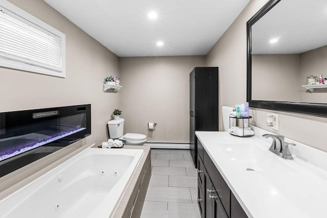 bathroom with toilet, tiled tub, a baseboard heating unit, tile patterned floors, and vanity