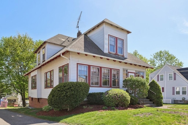 26 W Walnut St, Milford, MA 01757 - exterior space featuring a front lawn and a chimney