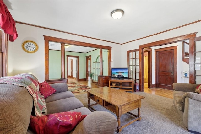 26 W Walnut St, Milford, MA 01757 - living room featuring crown molding, baseboards, and wood finished floors