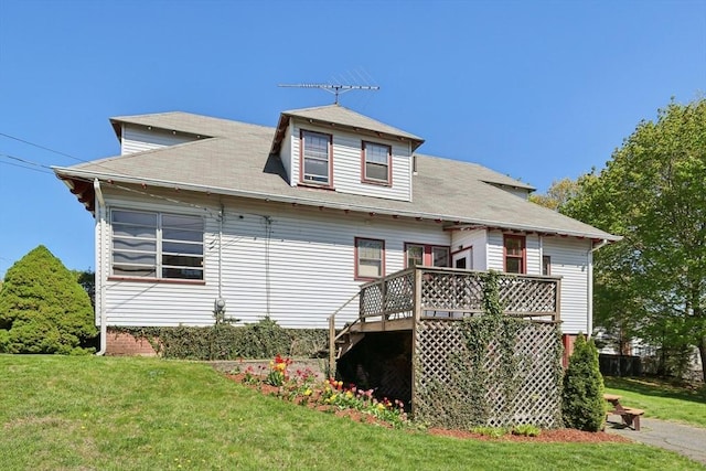 26 W Walnut St, Milford, MA 01757 - rear view of house with a yard and a wooden deck