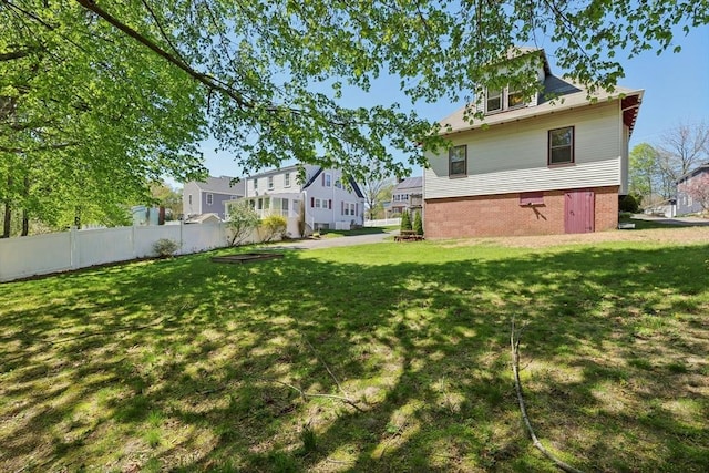 26 W Walnut St, Milford, MA 01757 - view of yard featuring a residential view and fence