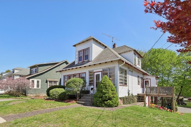 26 W Walnut St, Milford, MA 01757 - bungalow-style house with a chimney, a front yard, and a deck