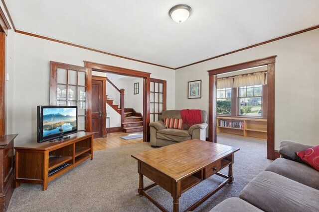26 W Walnut St, Milford, MA 01757 - living room with stairway, ornamental molding, carpet floors, and baseboards