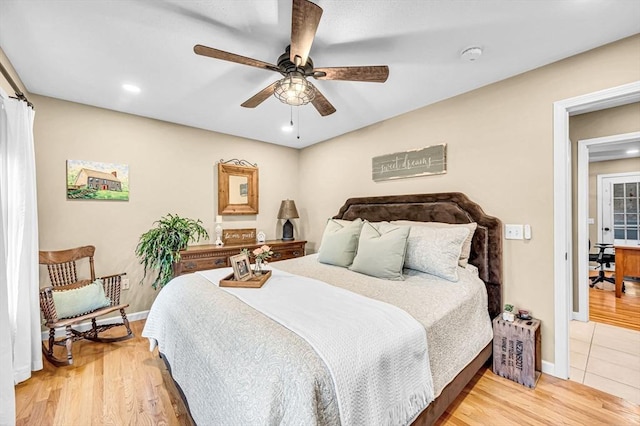 bedroom with ceiling fan and wood-type flooring