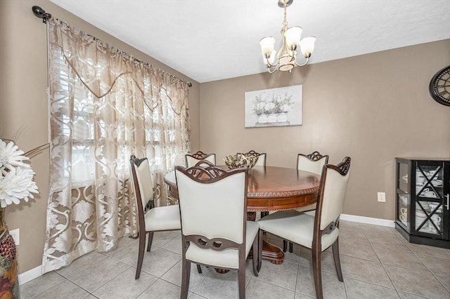 14 Watson St Unit 4, Lowell, MA 01852 - dining area with a chandelier and light tile patterned floors