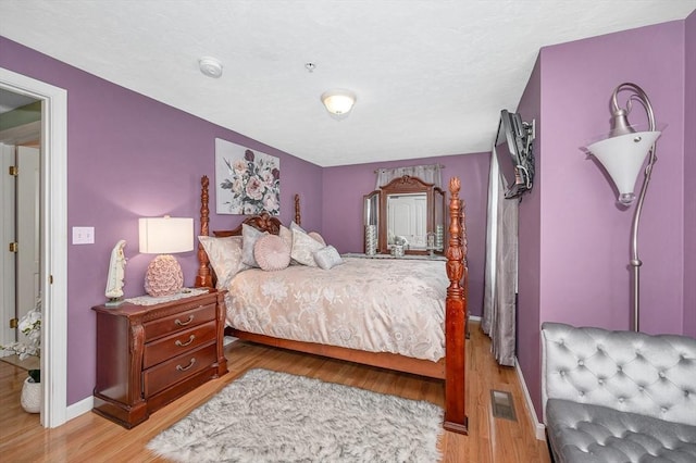 14 Watson St Unit 4, Lowell, MA 01852 - bedroom featuring light wood finished floors and baseboards