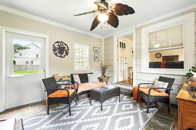 2480 Wilbraham Rd, Springfield, MA 01129 - living area with stone tile flooring, healthy amount of natural light, crown molding, and a ceiling fan