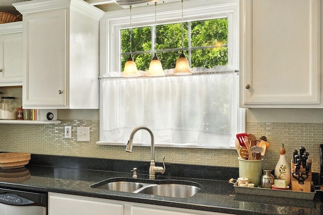 2480 Wilbraham Rd, Springfield, MA 01129 - kitchen with a sink, stainless steel dishwasher, white cabinets, and tasteful backsplash