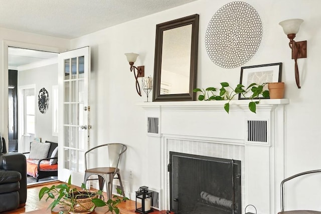 2480 Wilbraham Rd, Springfield, MA 01129 - living room featuring a brick fireplace and wood finished floors