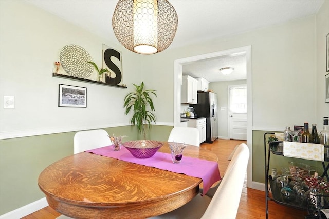 2480 Wilbraham Rd, Springfield, MA 01129 - dining area featuring light wood-type flooring and baseboards