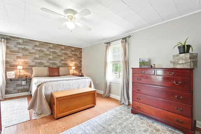 2480 Wilbraham Rd, Springfield, MA 01129 - bedroom featuring crown molding, light wood-type flooring, a ceiling fan, and baseboards