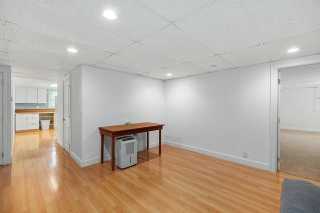 32 Witham St Unit B, Gloucester, MA 01930 - below grade area featuring light wood-style flooring, baseboards, and recessed lighting