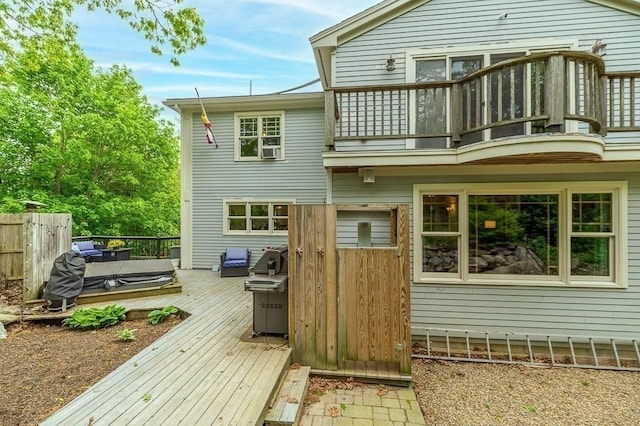 32 Witham St Unit B, Gloucester, MA 01930 - rear view of house featuring a balcony and a wooden deck