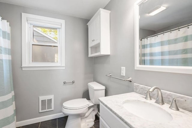 full bath with visible vents, tile patterned flooring, baseboards, vanity, and toilet